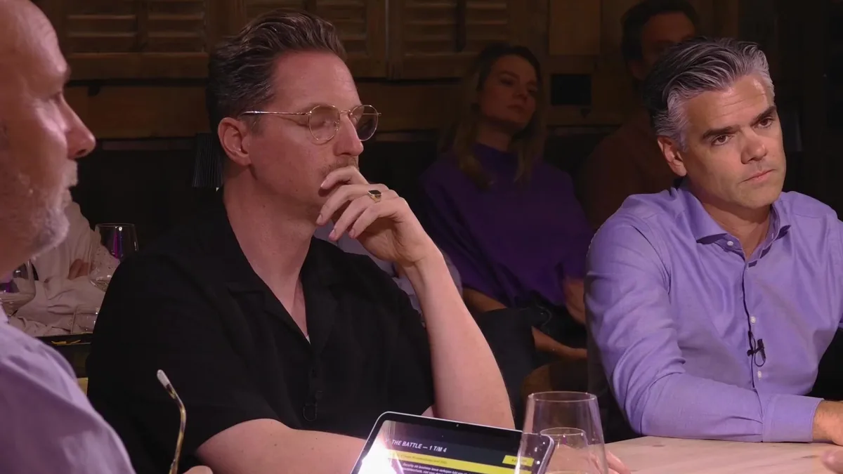 Guests at the MSP Late Night table, with the audience behind them